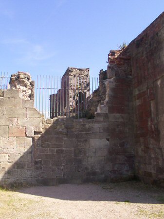 Stafford Castle, motte and bailey earthworks surmounted by remains of later castles.